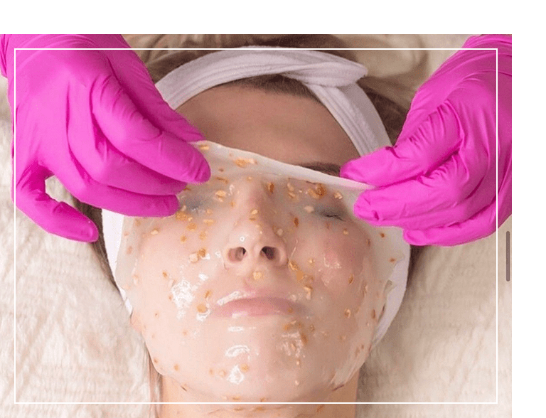 A woman is getting her face covered with rice.